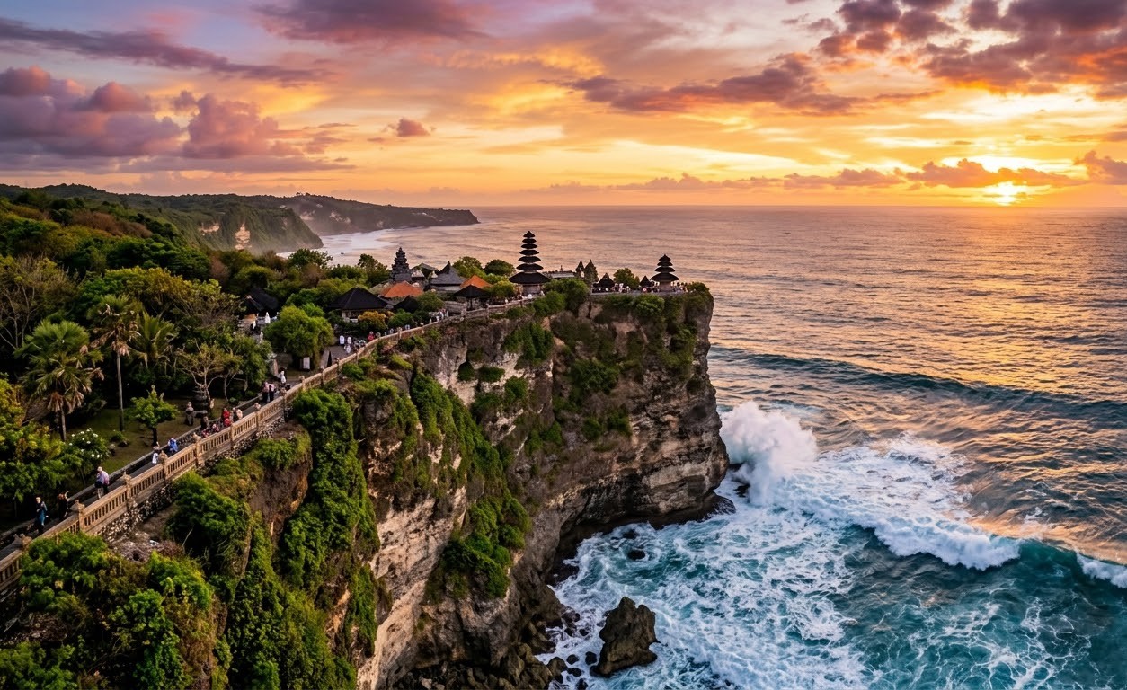 Dramatic sunset view of Uluwatu Temple perched on ocean cliffs in South Bali Dramatic sunset view of Uluwatu Temple perched on ocean cliffs in South Bali